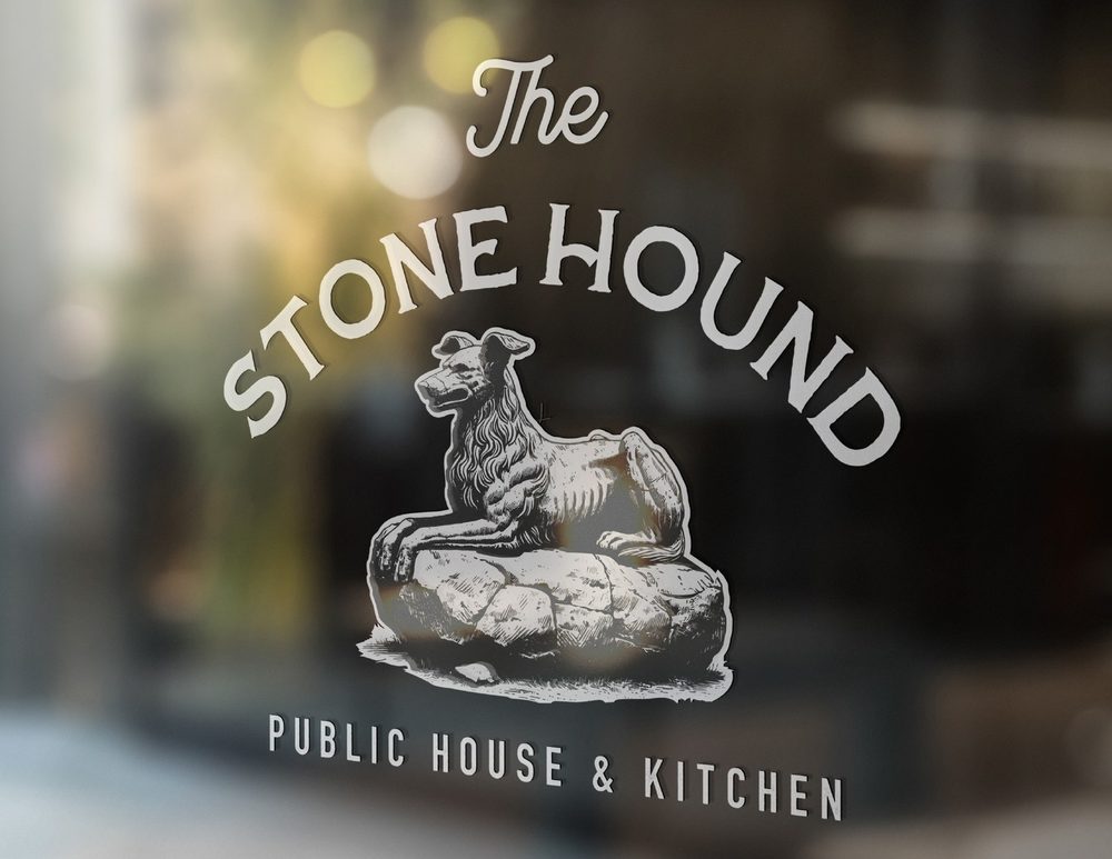 The Stone Hound — Window signage